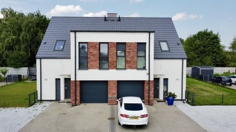 Nowoczesny dom w zabudowie bliźniaczej w Tarnowie Podgórnym – Komfort i Spokój